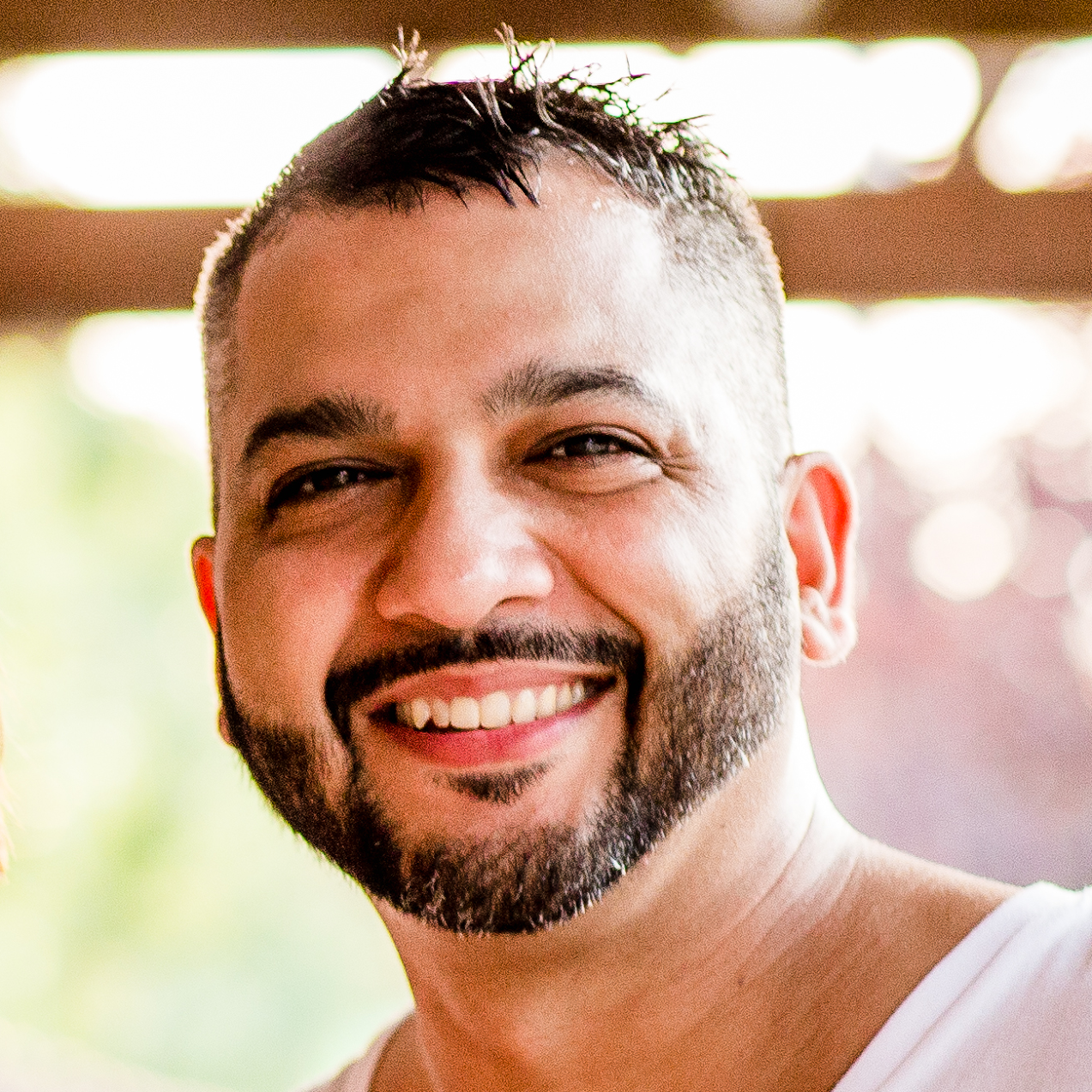 Alyx Ancira smiling for a portrait